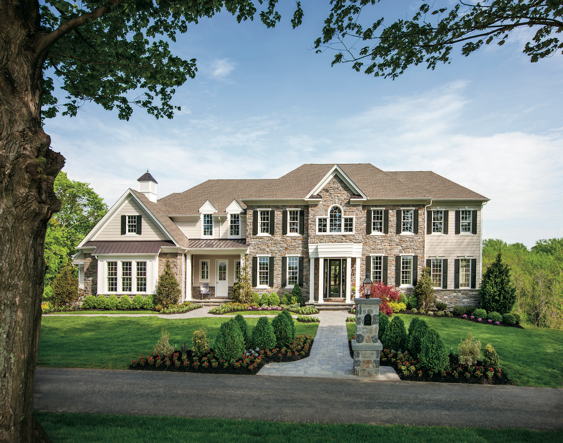 A suburban house in Pennsylvania with hardscaping and curb appeal.