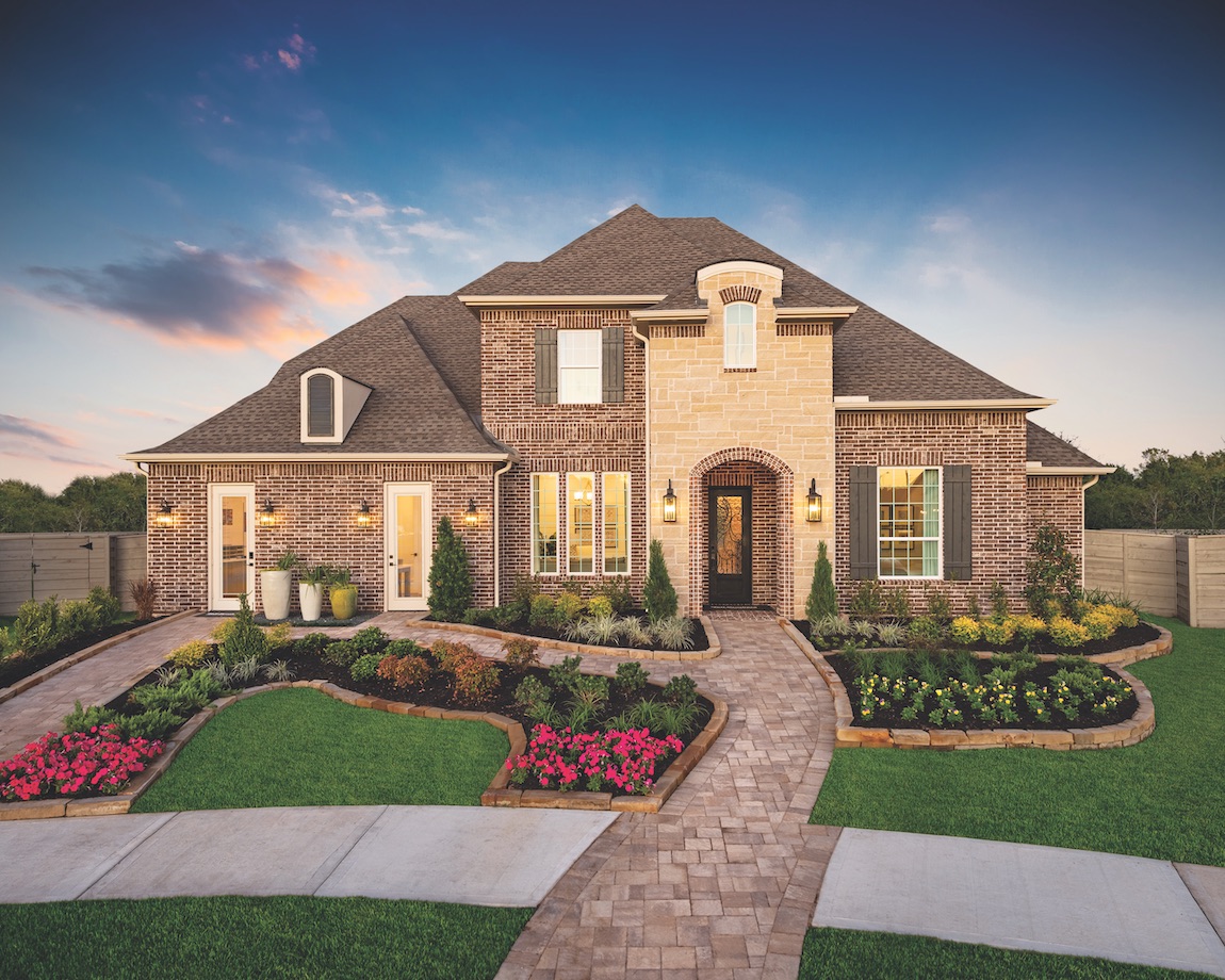 Home in Texas with brick exterior and landscaping.
