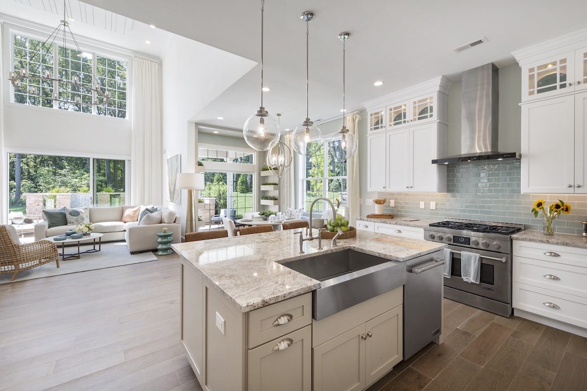 Home interior featuring living room, kitchen, and dining spaces.