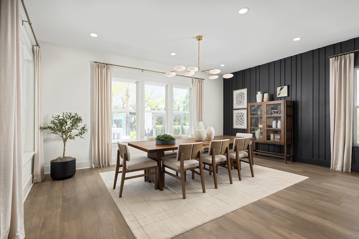 formal dining room setting with black accent wall