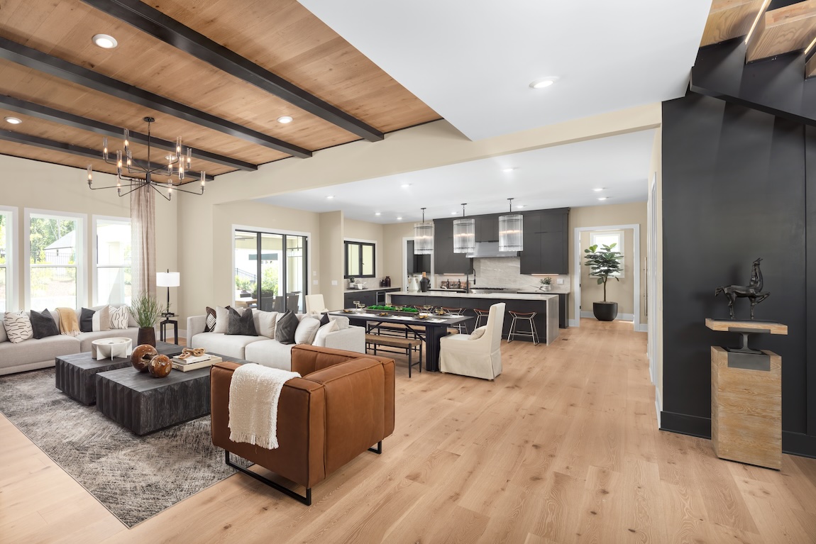 open-concept floor plan connecting the kitchen, dining, and living space of the home