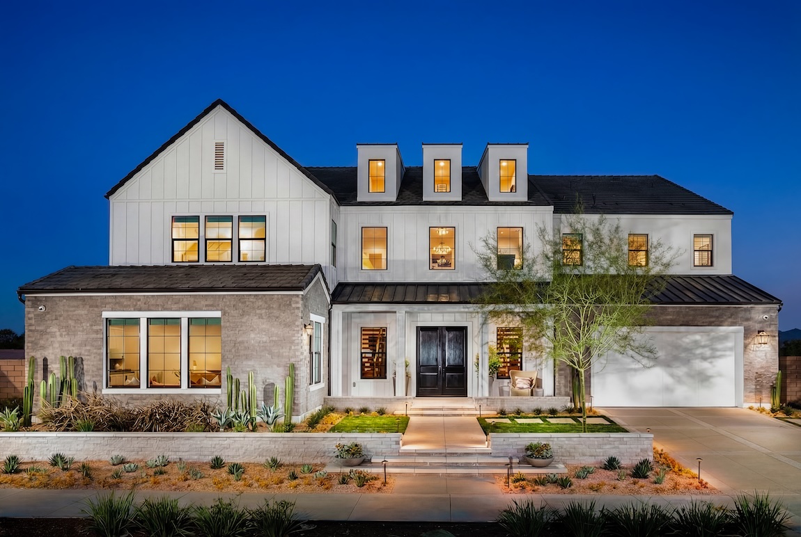 Modern luxury home exterior in Valencia, CA, featuring clean architectural lines and landscaped curb appeal.