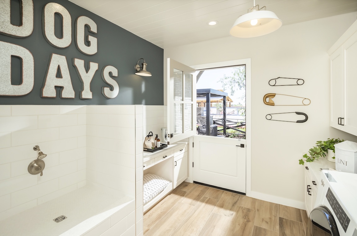 pet nook with natural light and a built-in bed and shower