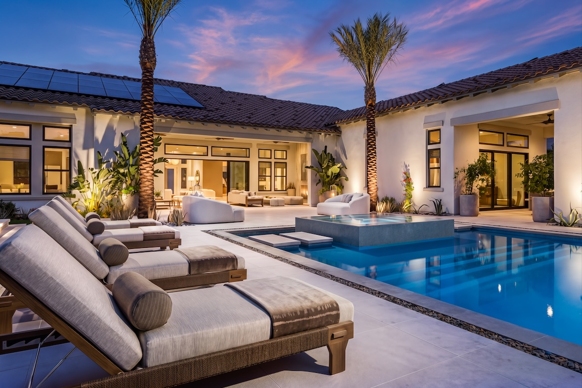 backyard pool with lounge seating