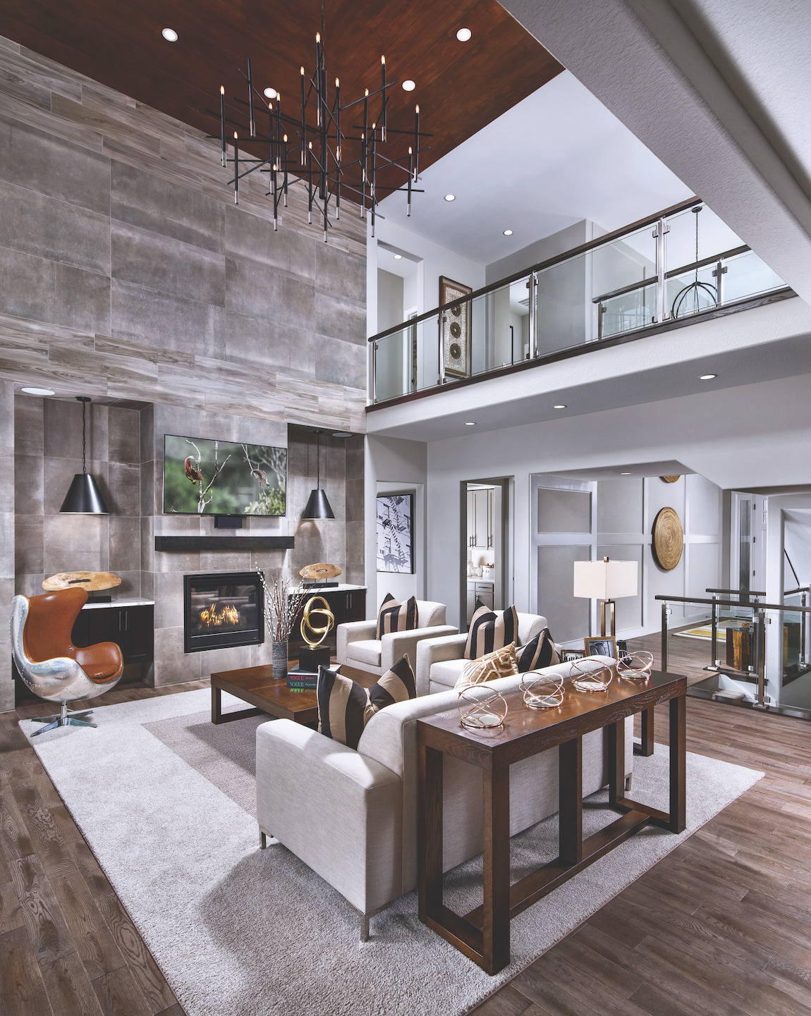 Great room with stone walls and wooded ceiling