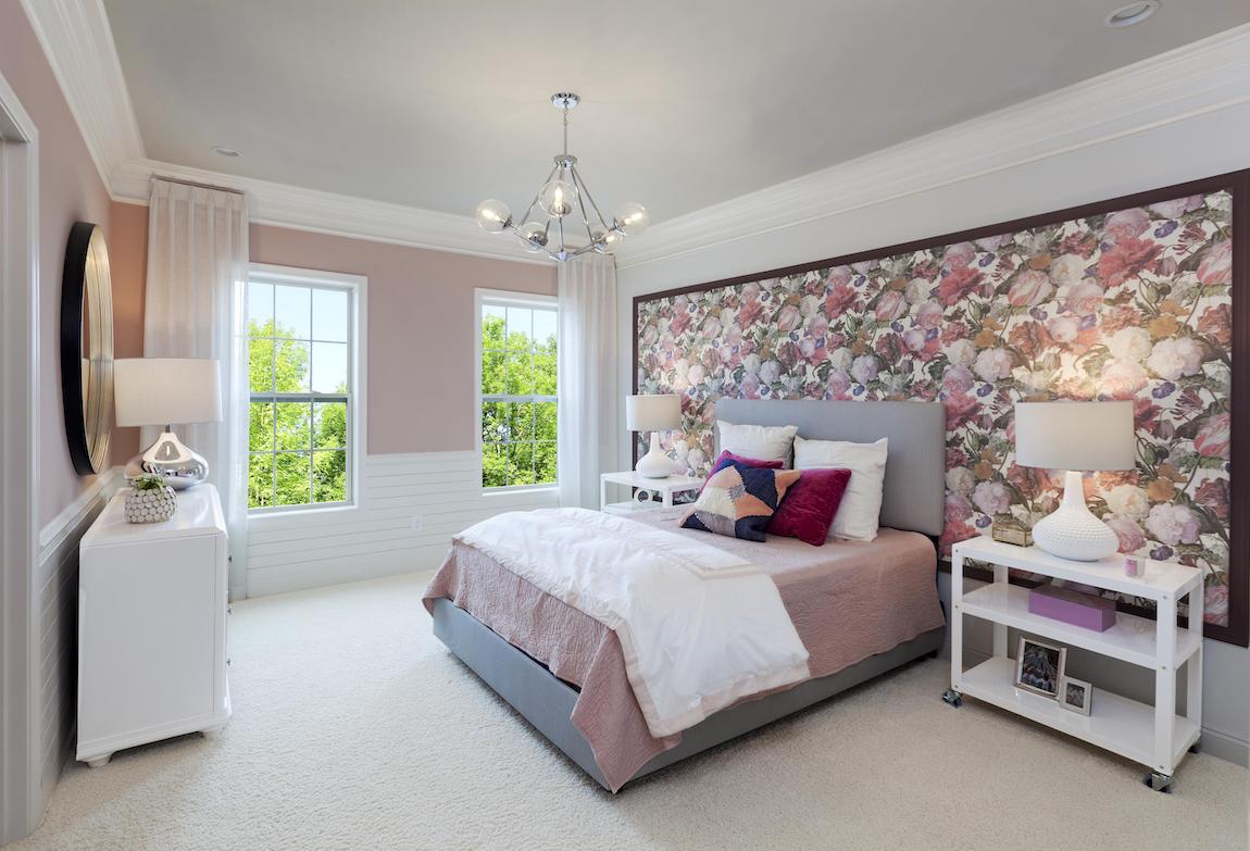 Teen bedroom highlighted by light tones and large floral artwork