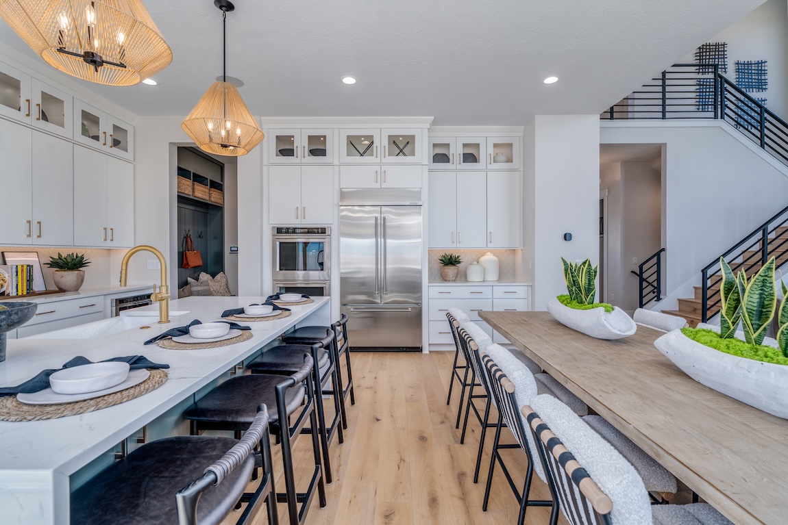dining room and kitchen space with large island and pendant lighting