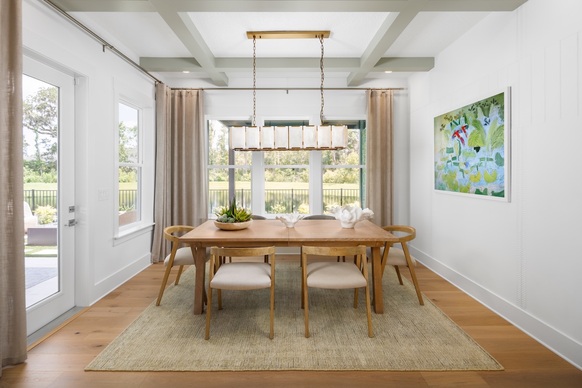 modern dining room with wood beam ceiling