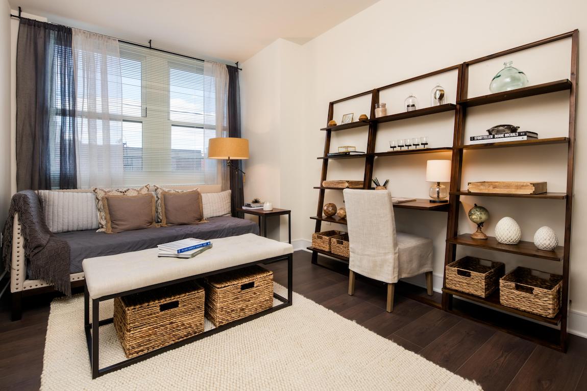 Home office space with vertical shelving