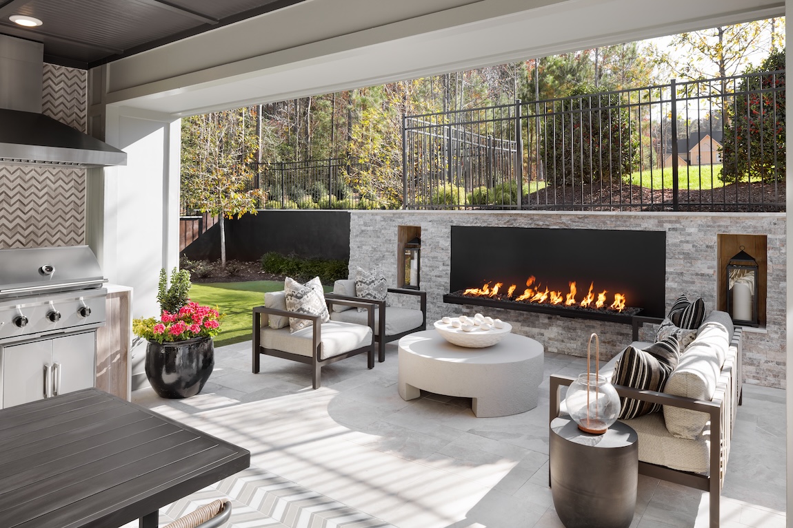 patio with fireplace and comfortable seating