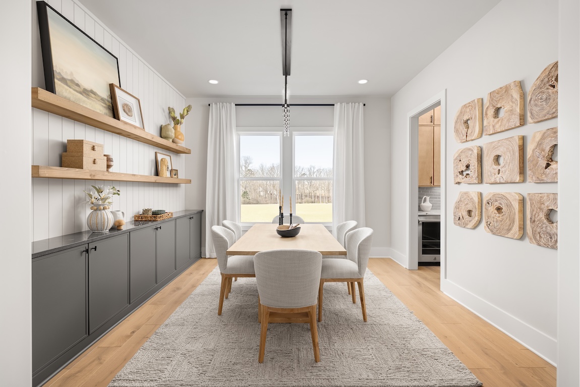 dining room with shiplap accent wall