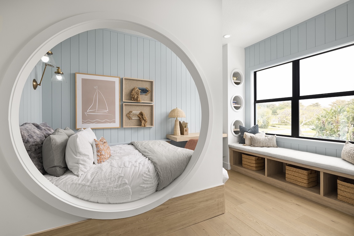 secondary bedroom with blue shiplap walls