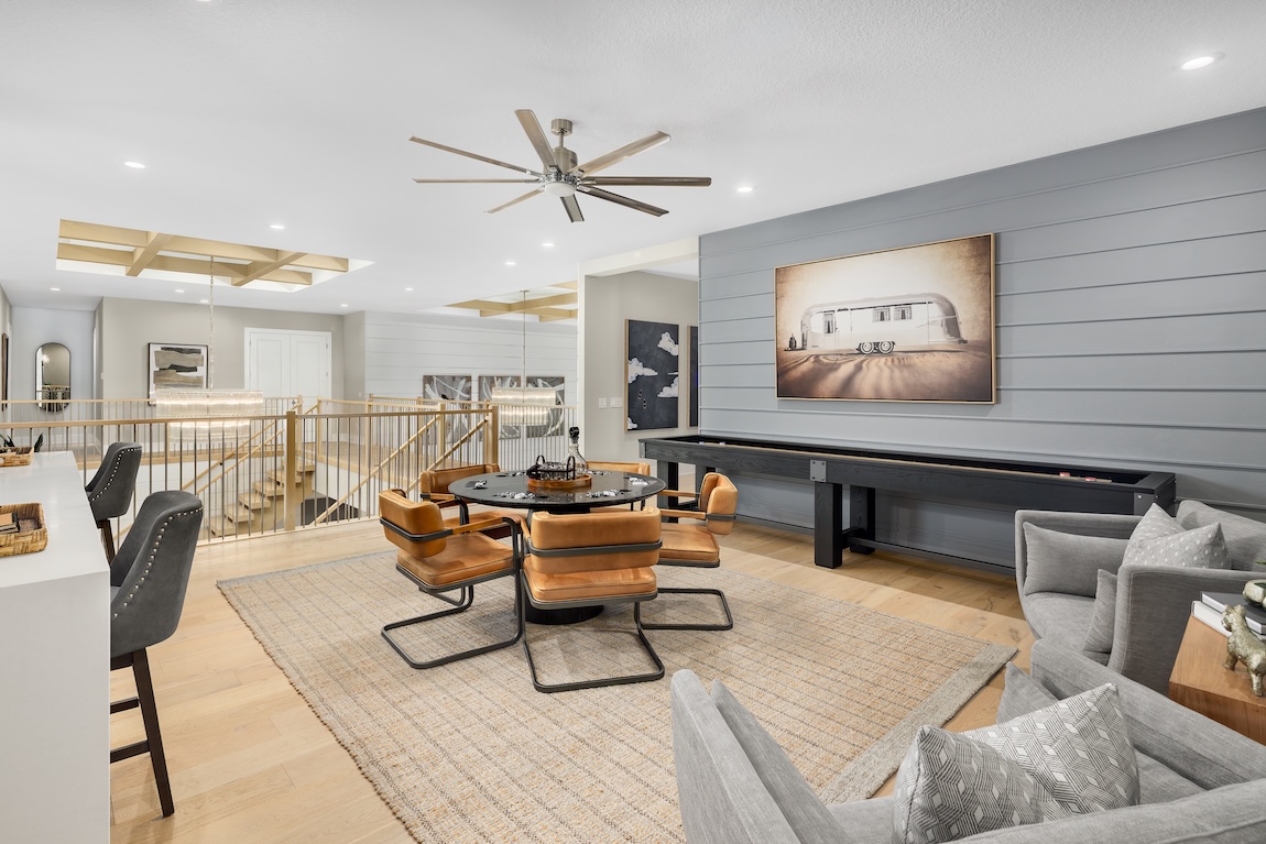 loft space with a colored accent wall