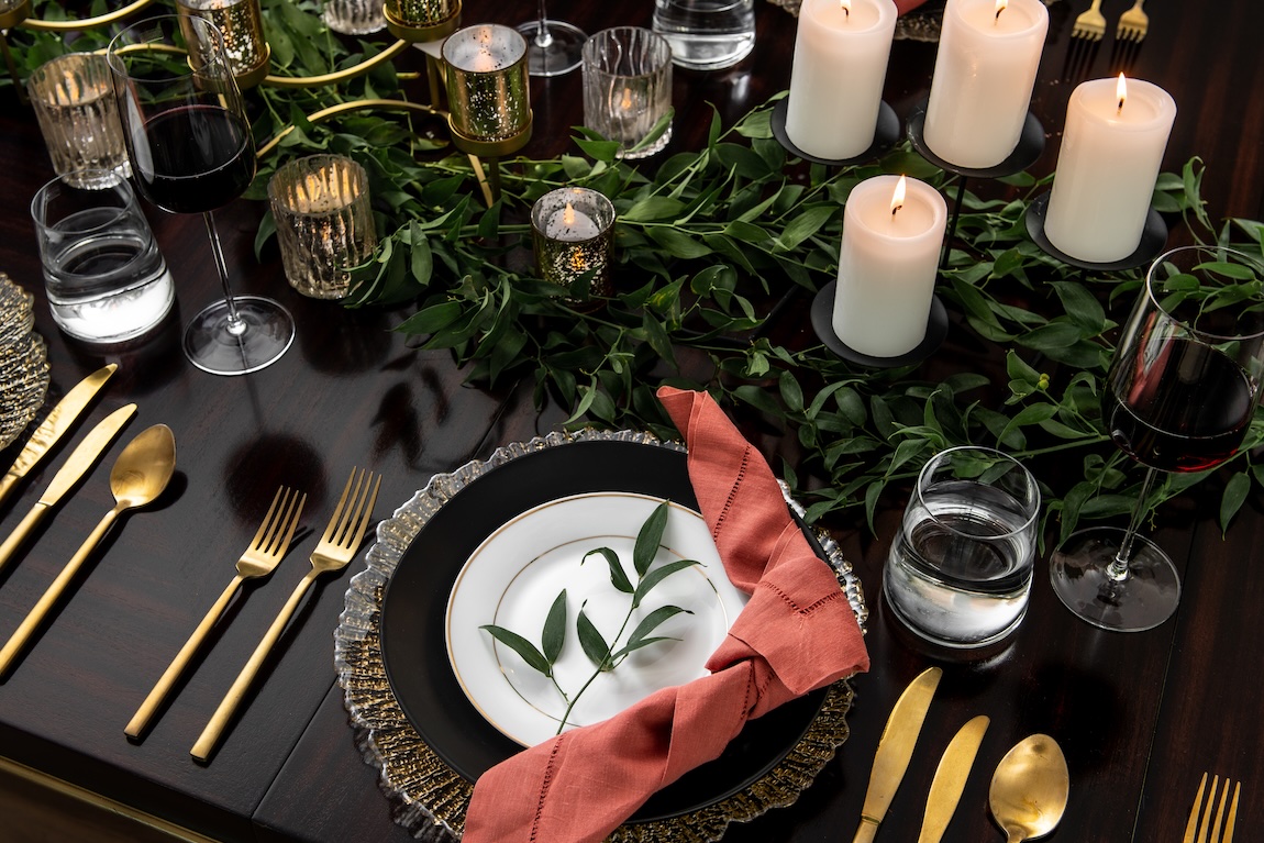 holiday table decor with candles and flowers