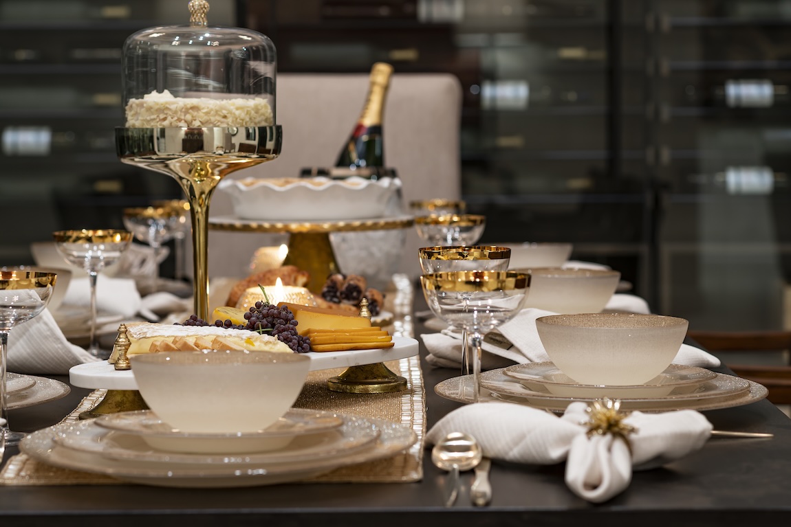 table setting for the holidays with fine glasswear