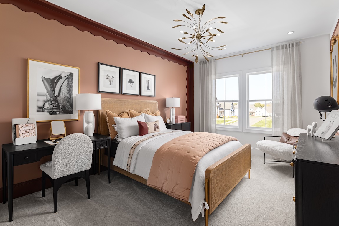 pink bedroom with scalloped wall detailing