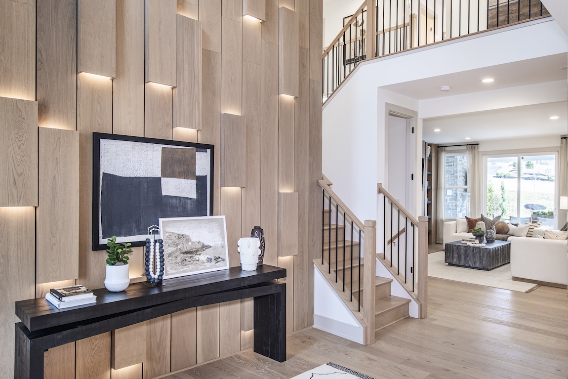entryway with stunning wooden accent wall