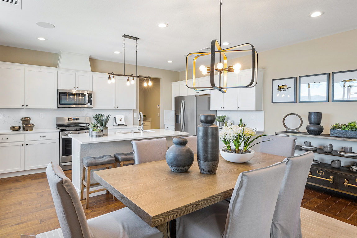 Rectangle wooden table in breakfast area of kitchen