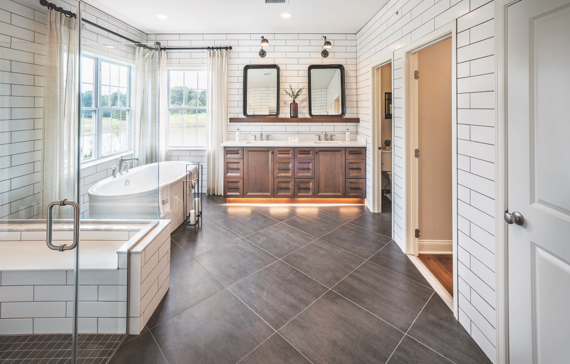 Luxe modern bathroom with accent lighting