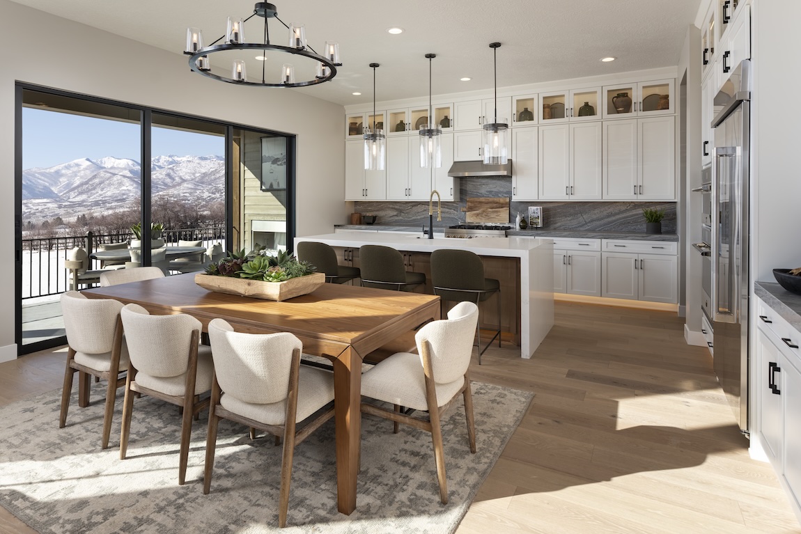 luxury kitchen and dining space with views of mountains