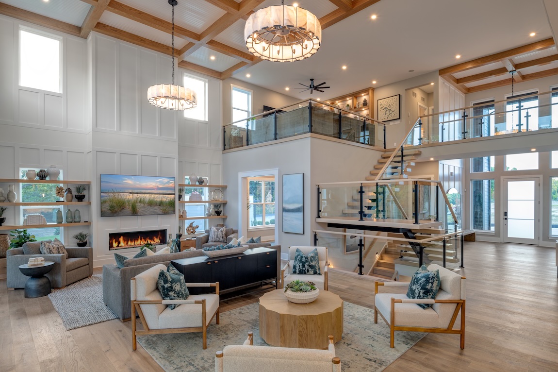 luxury great room with views of the grand staircase and sectional sofa