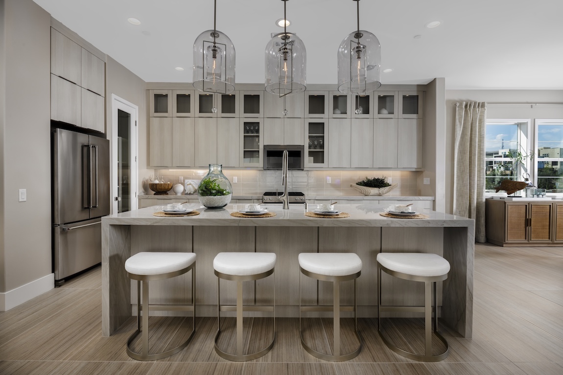 kitchen with gray cabinets and glass features