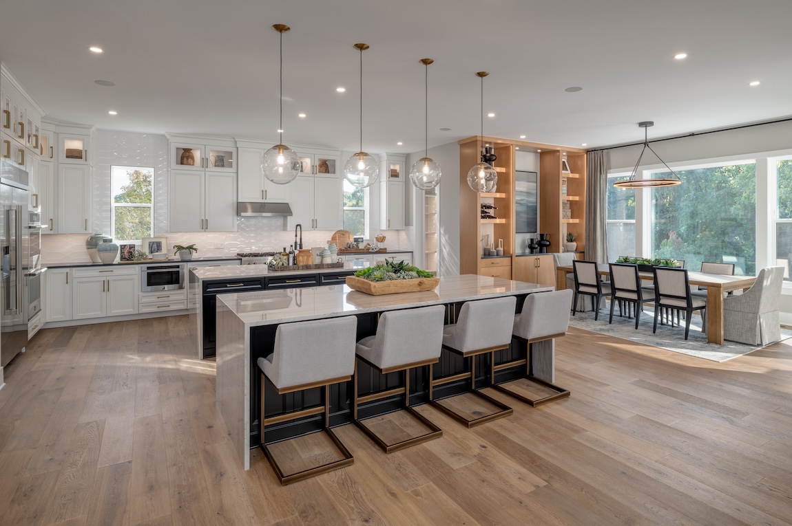 modern kitchen with waterfall island and seating