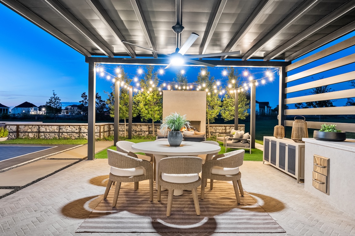 outdoor dining with string lights