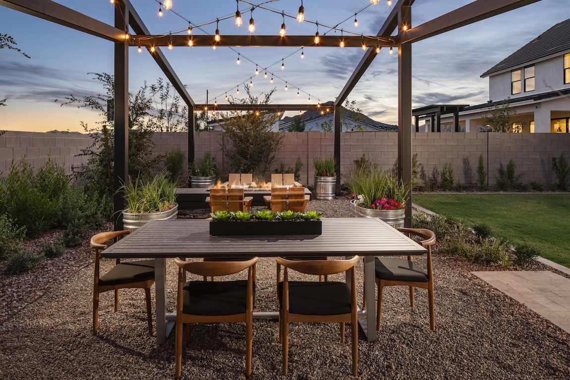 outdoor dining table with string lights