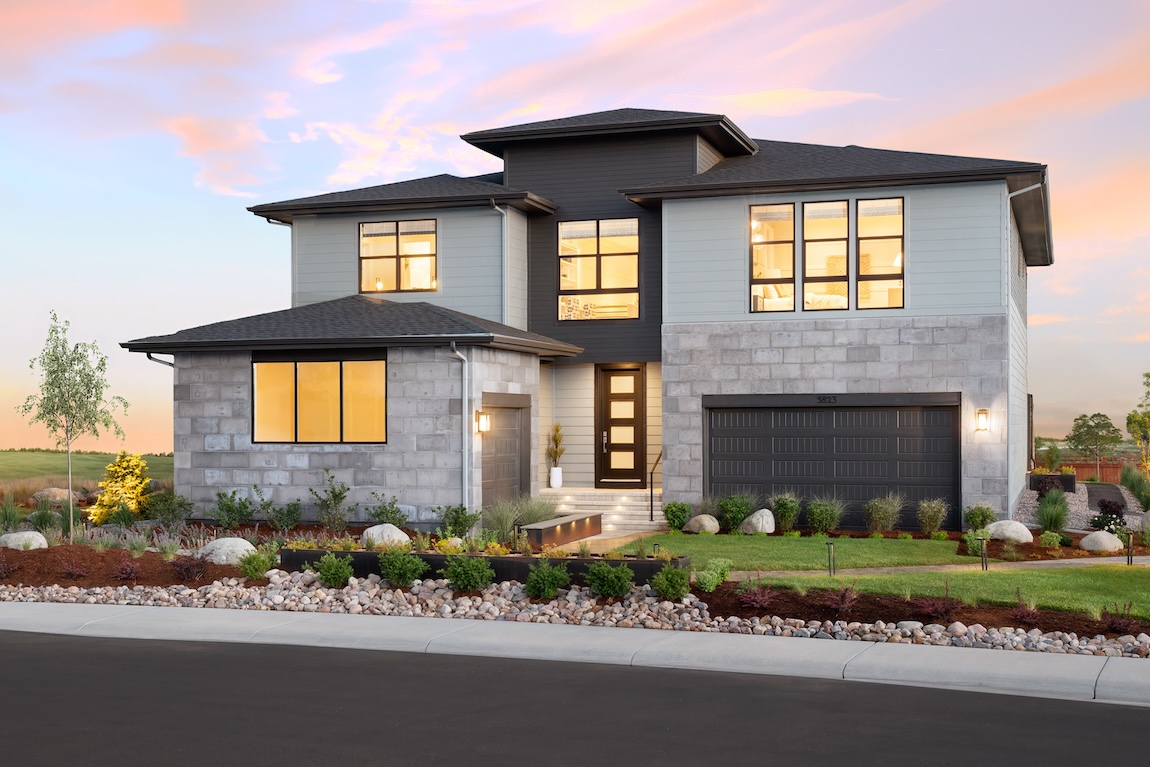 exterior of home with black accents and lighting