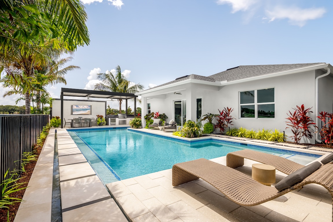 outdoor living space with pool and lounge seating