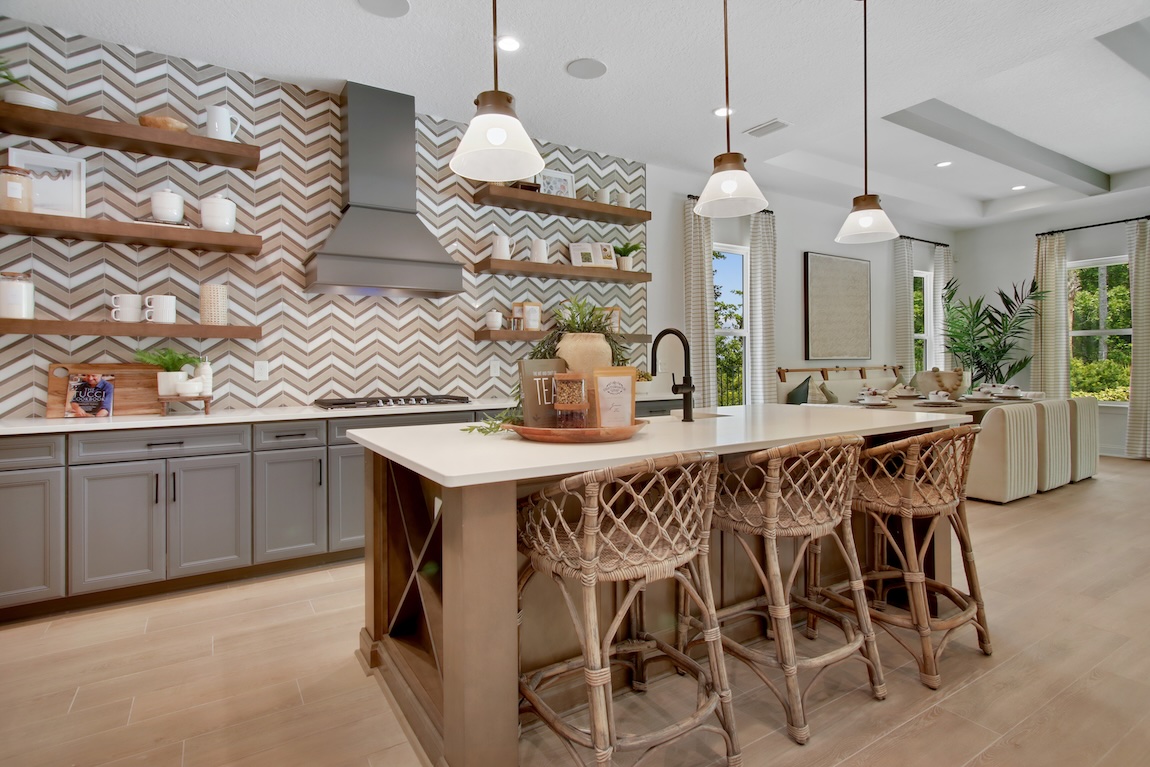 kitchen with herringbone backsplash  and wooden cabinetry
