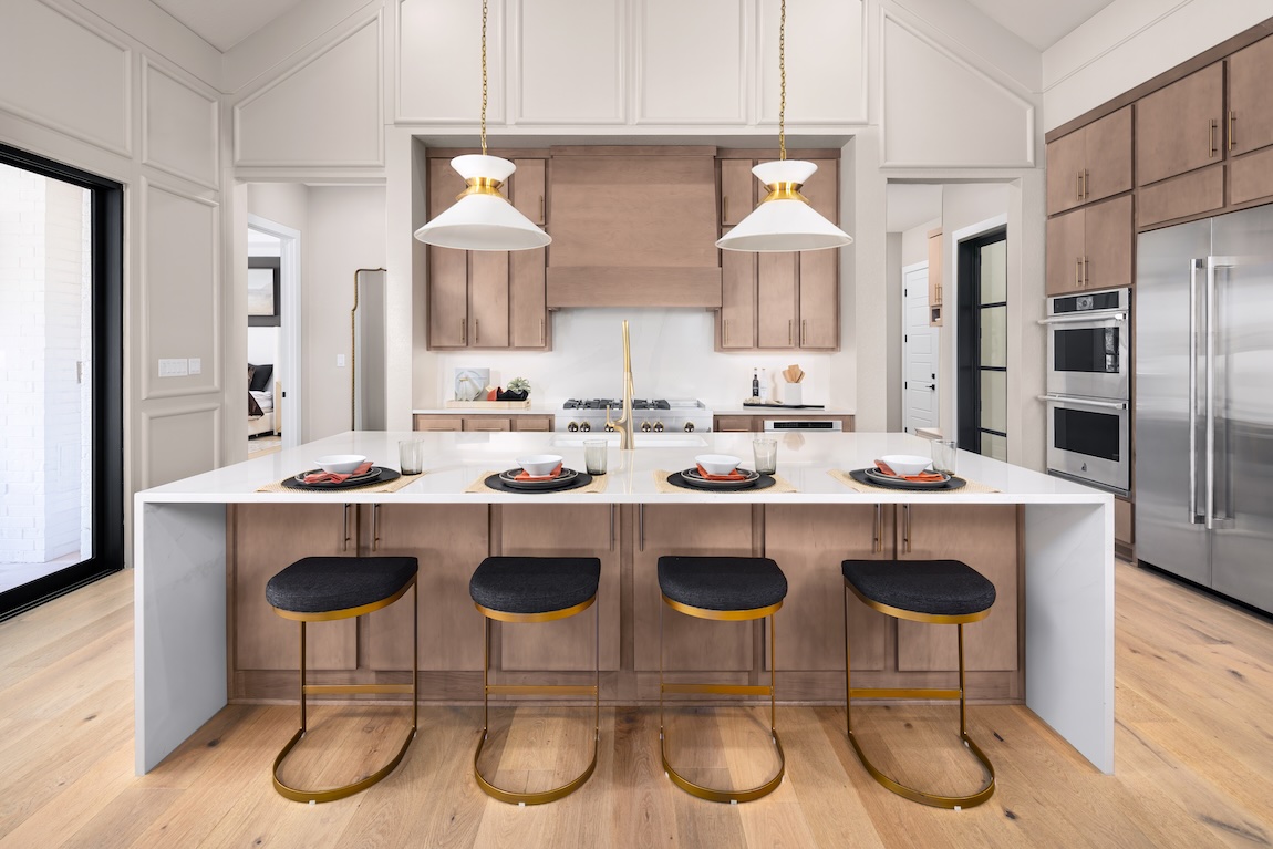 modern kitchen with marble waterfall island