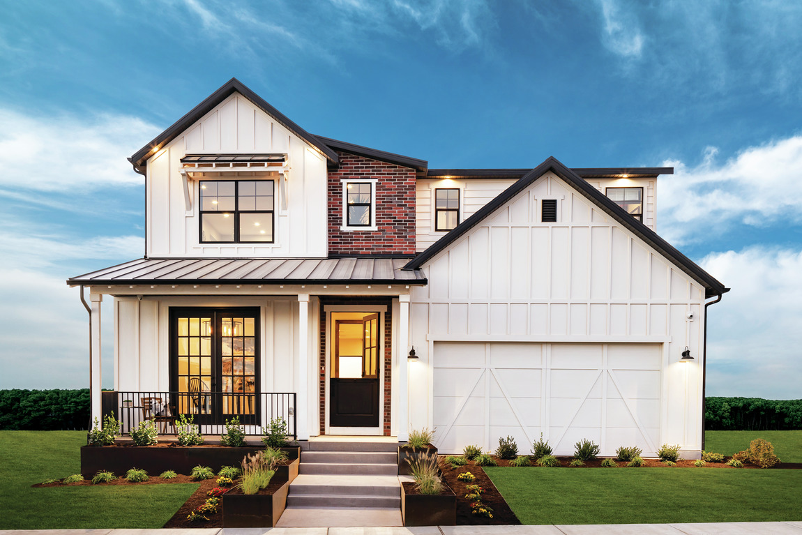 White and brick modern farmhouse exterior new home Utah