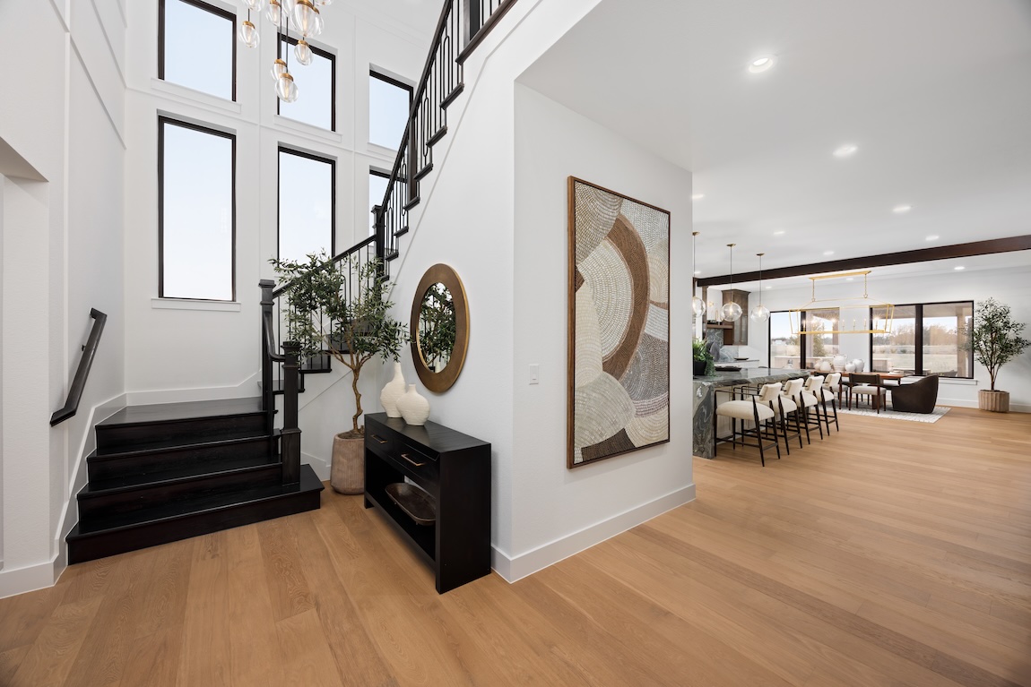 modern home entryway with wall decor and art