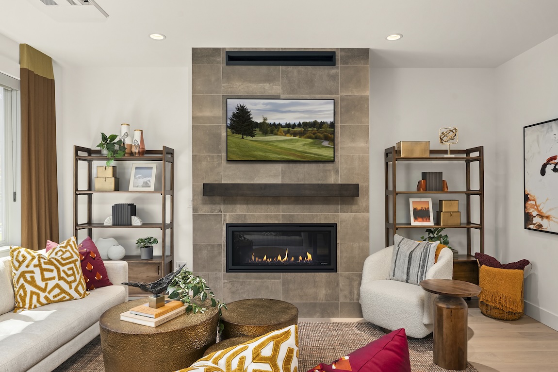 modern living room with tile mantel and fireplace
