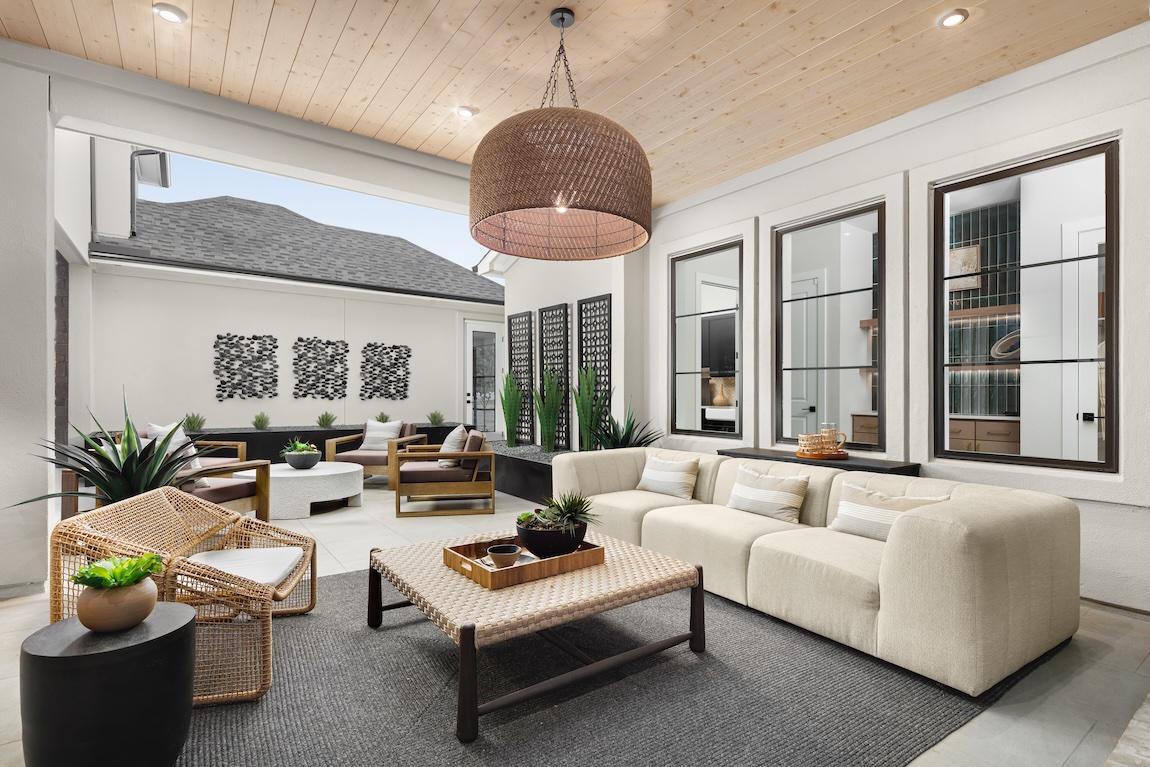 comfortable outdoor seating area with greenery throughout