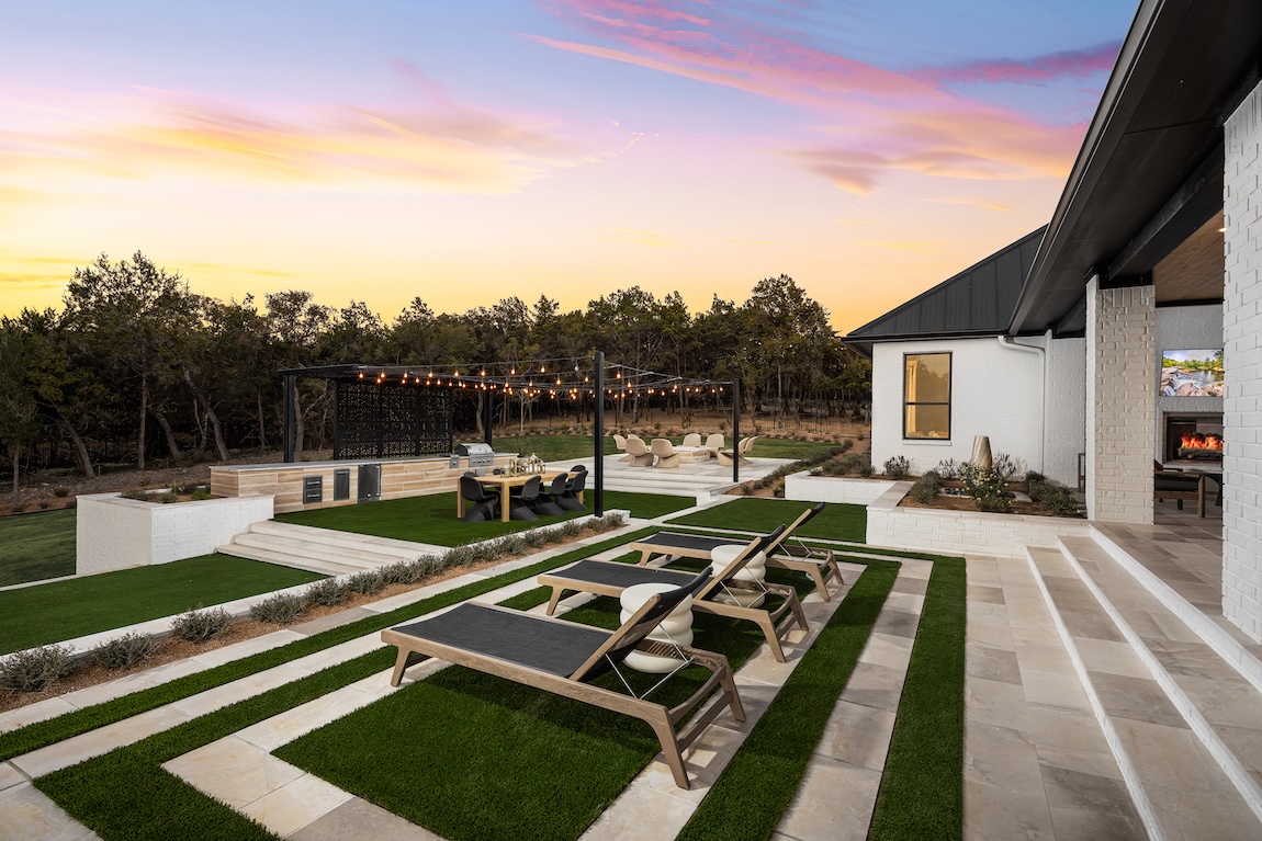 outdoor living space with seating and string lights