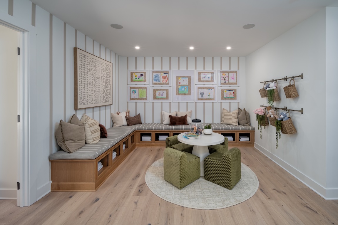 loft space for kids with round table and seating bench