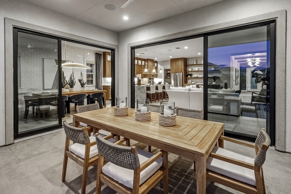 outdoor living space with wooden and white features