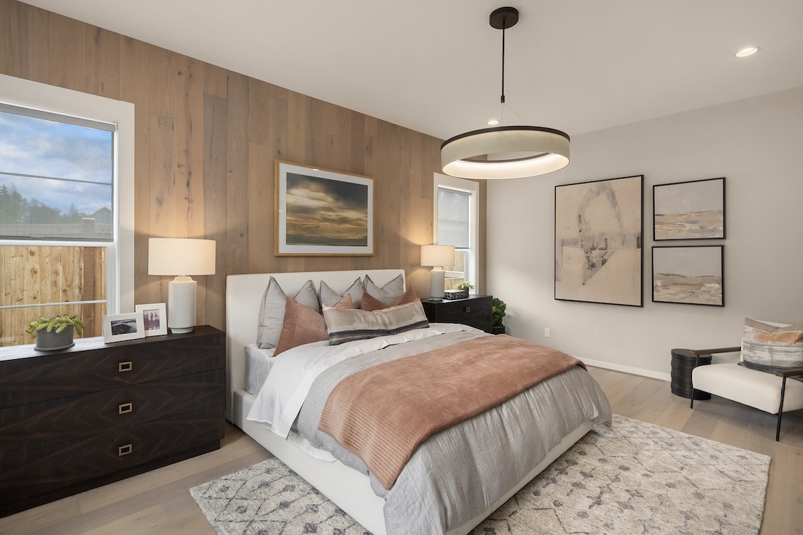 master bedroom with statement lighting