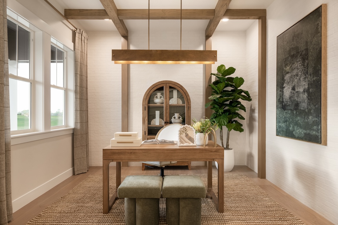 modern home office with wood beam ceiling