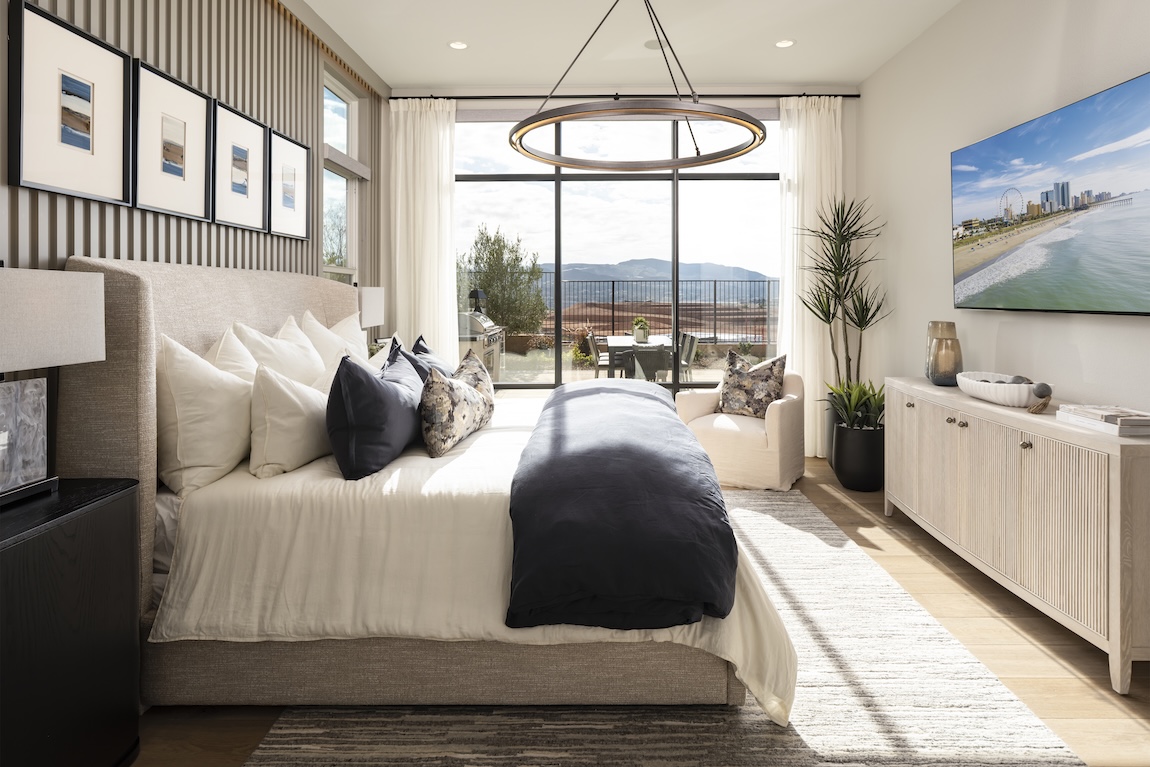 primary bedroom with large glass windows