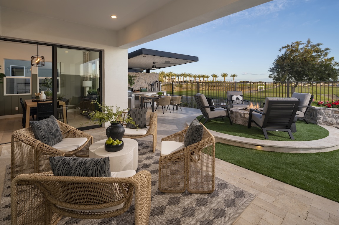 outdoor lounge area with seating and fire pit