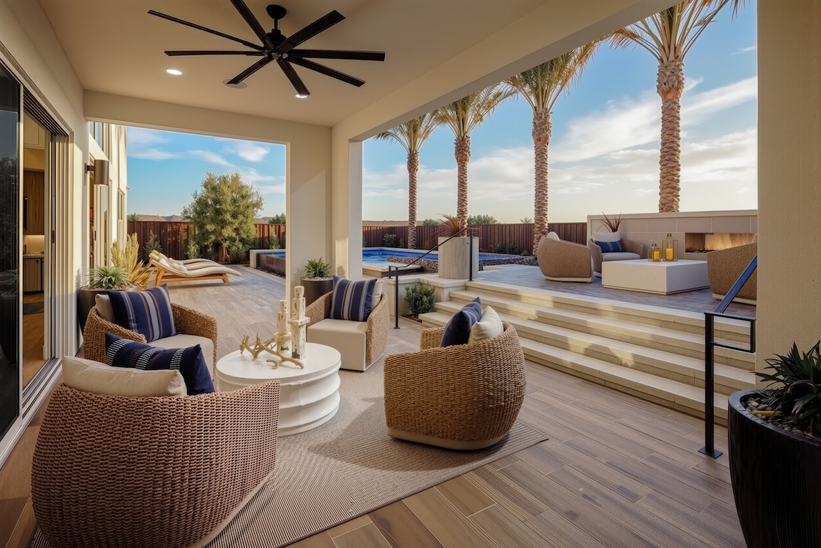 outdoor patio with woven furniture and coastal accents