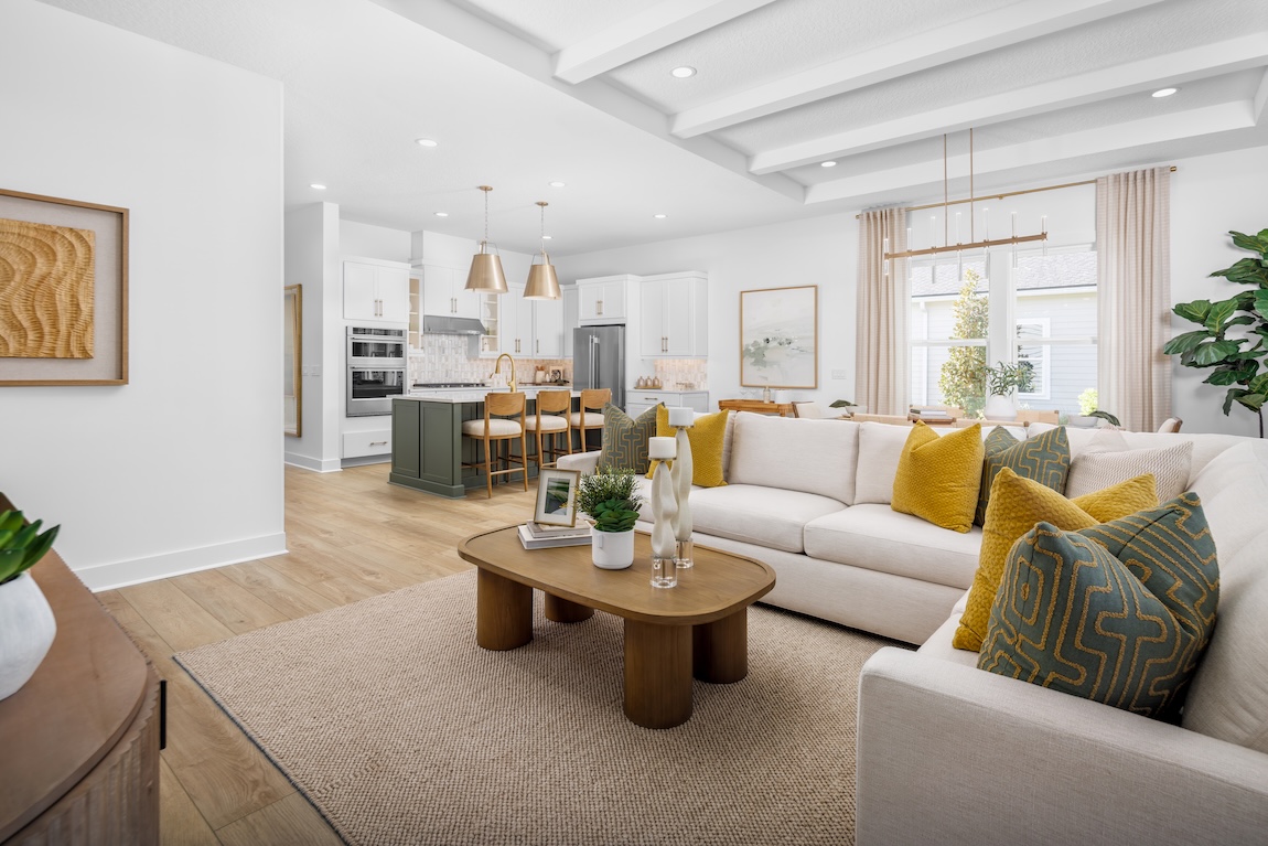 living space with green and yellow colored furnishings.