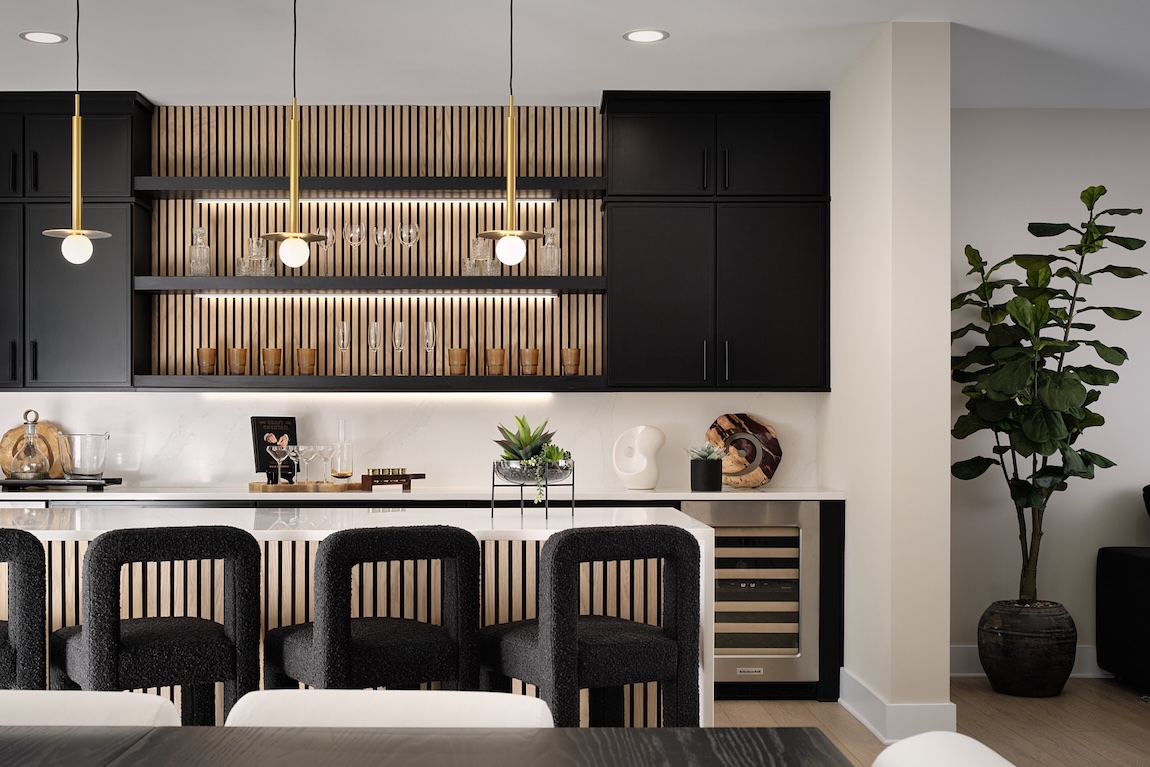 Black and white home bar with island and seating