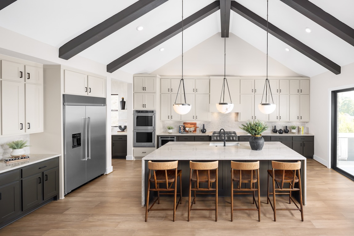 modern kitchen with a marble waterfall island
