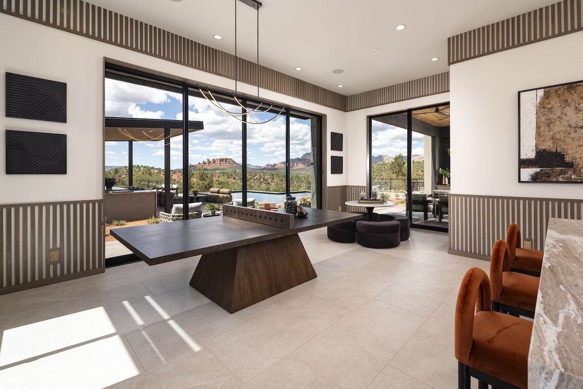 game room with ping pong and access to the outdoor living space