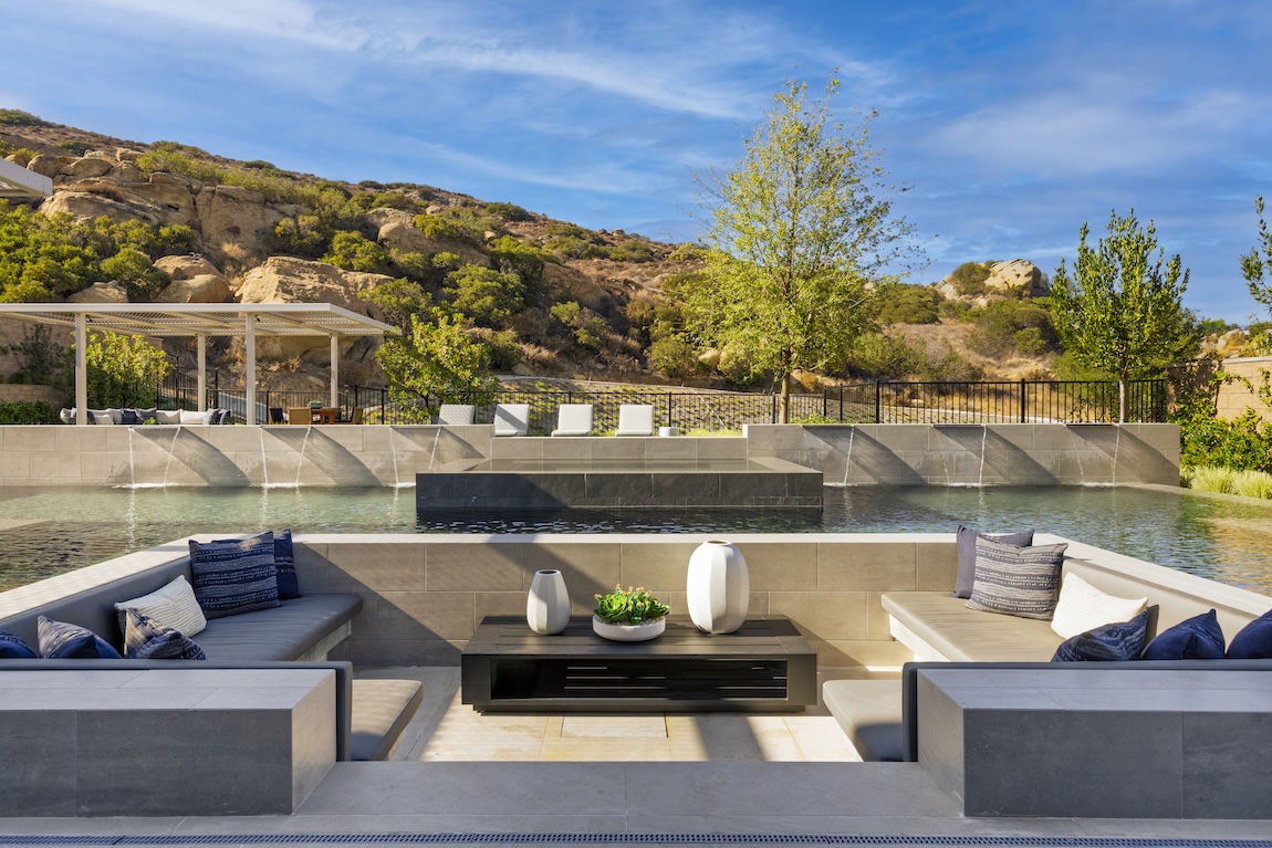 backyard retreat with pool and greenery